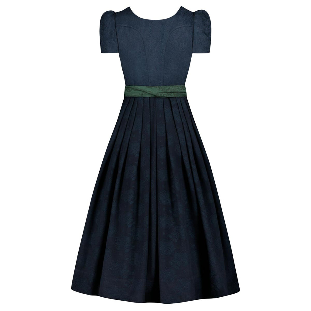 Navy blue dress with a green belt on a white background