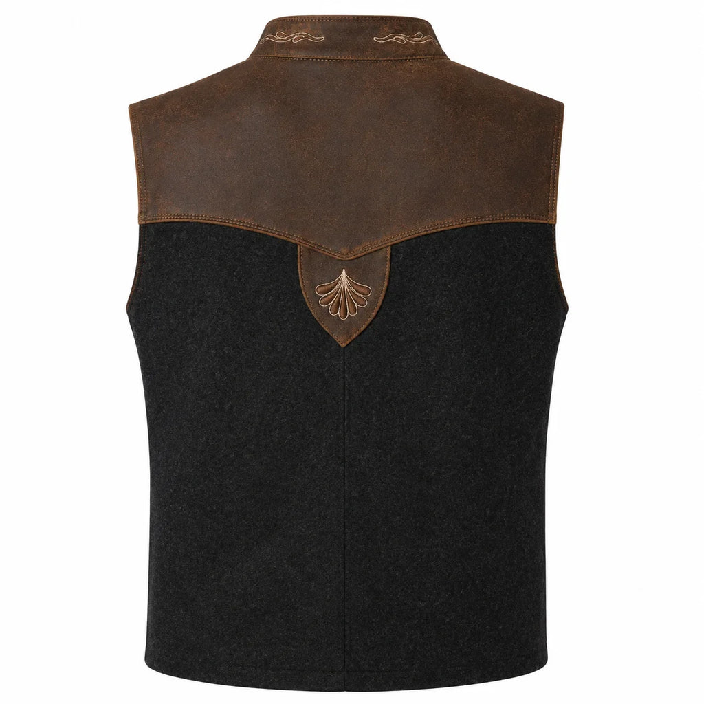 A sleeveless western-style vest with a black wool-like body, a brown leather yoke, and a matching brown shield-shaped patch with an engraved leaf design at the center back.