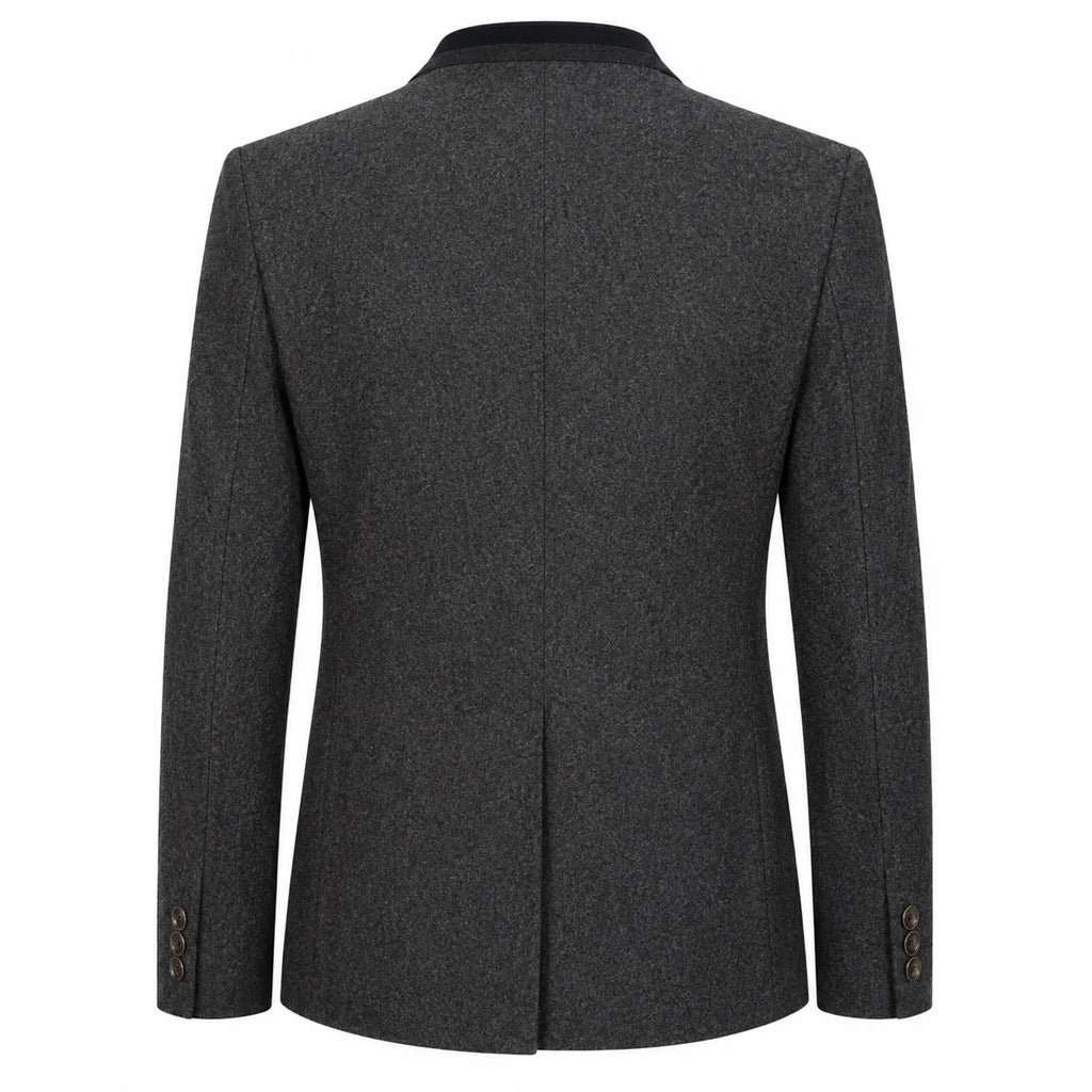 A dark gray textured wool blazer shown from the back, featuring a subtle heathered pattern, structured shoulders, and button details on the cuffs, set against a plain white background.
