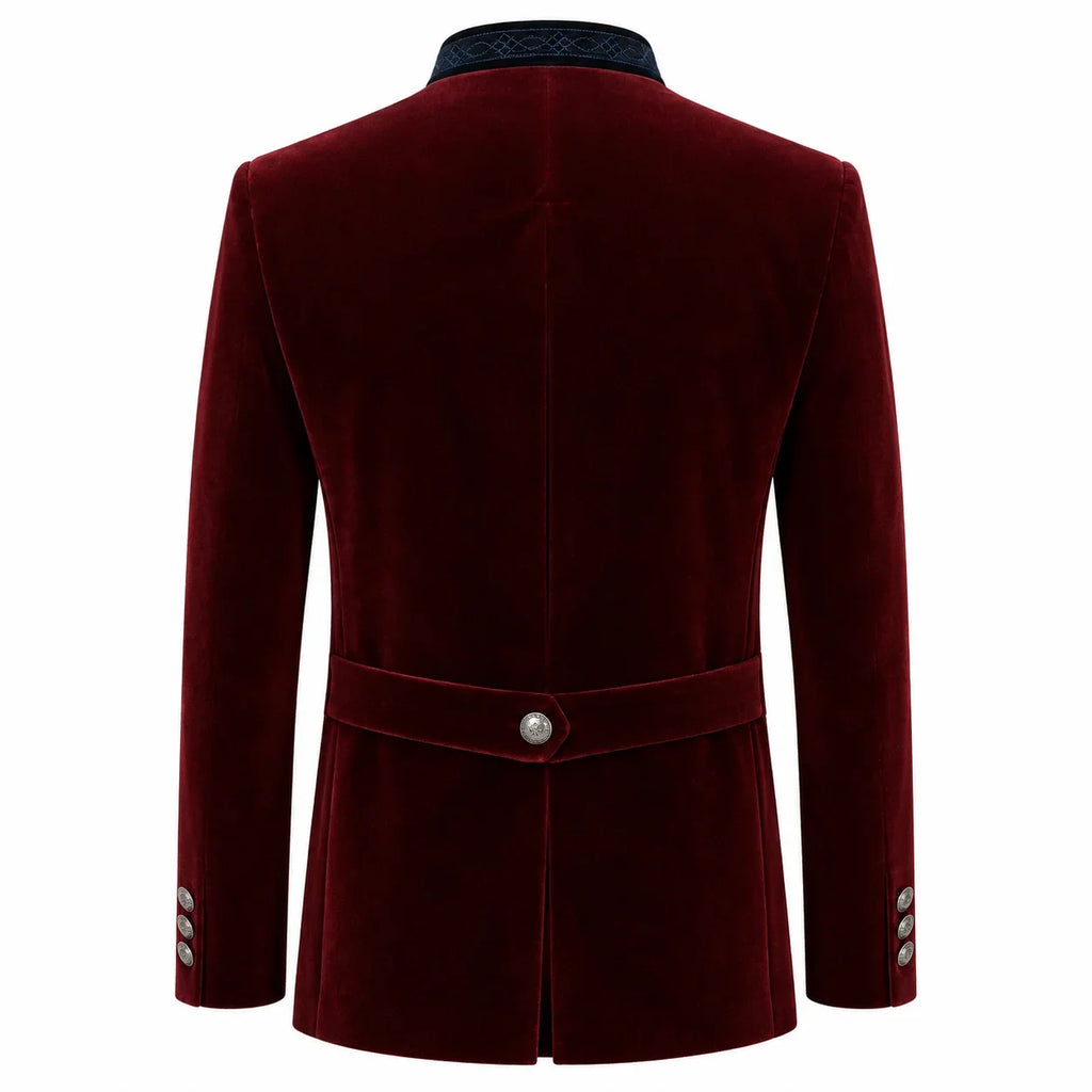 A men's longline velvet blazer shown from the back, featuring a deep burgundy red color, a matching waist belt with a single silver button, and decorative silver buttons on the cuffs, set against a plain white background.
