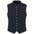 A dark navy blue wool vest with a high collar, decorative brown buttons down the front, and black trim details on the collar and pocket edges, shown against a plain white background.