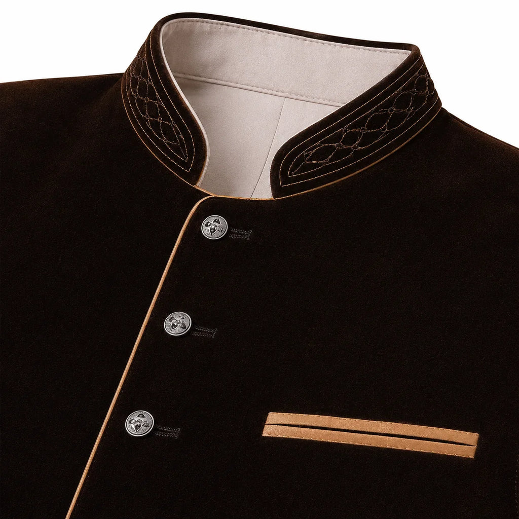 Close-up of a dark brown velvet jacket with a mandarin collar, silver buttons, and contrasting light brown piping details.